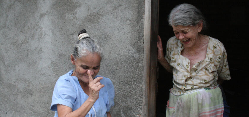 Two local women from Santa Barbara, Honduras, conversing animatedly