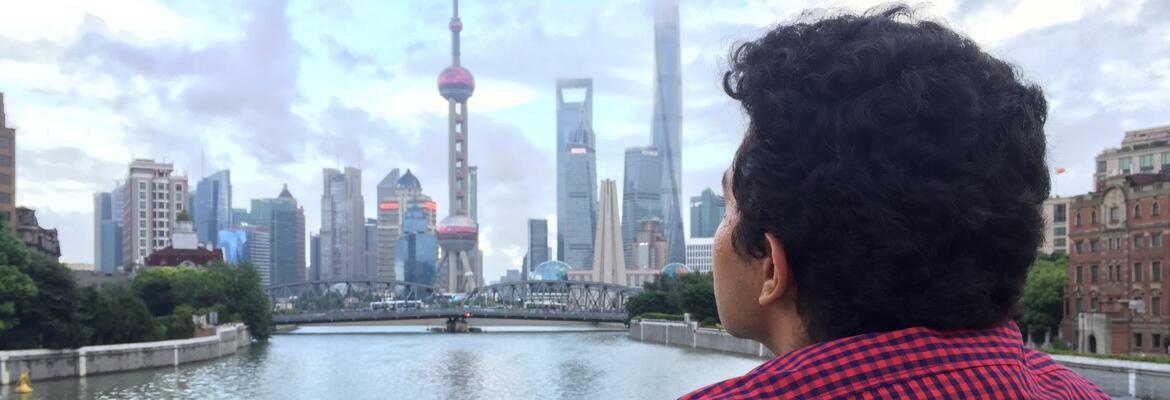 Student observing the Oriental Pearl Tower in Shanghai, China