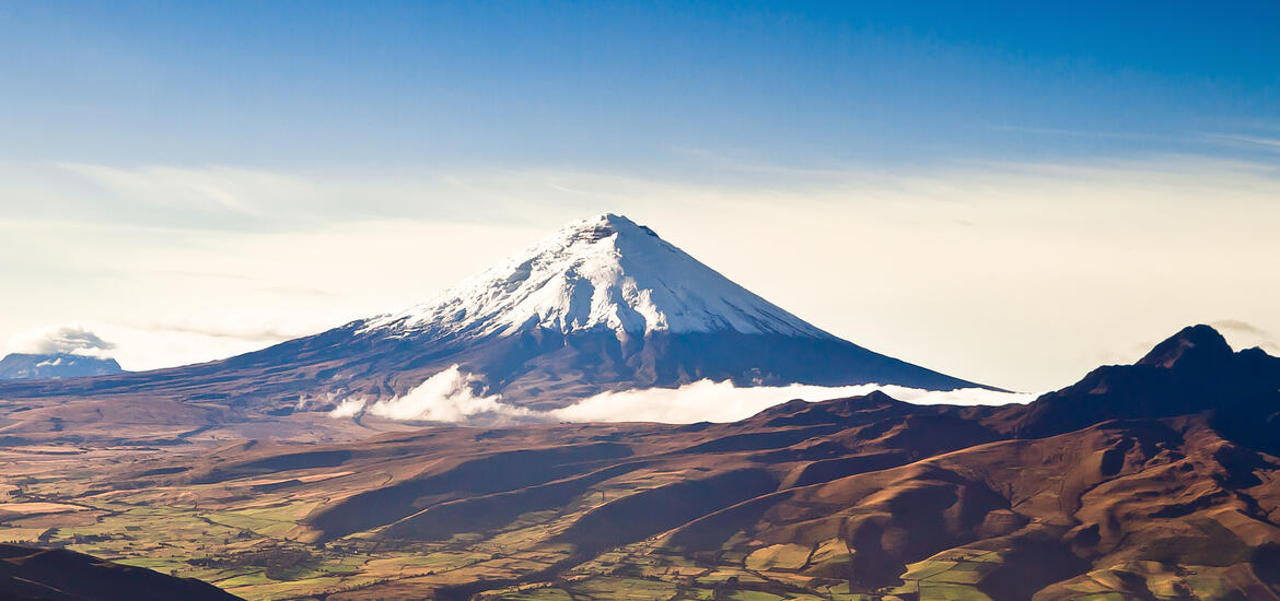 Aerial shot of the snow-capped Cotopaxi Volcano located in the Andes Mountains near Quito, Ecuador